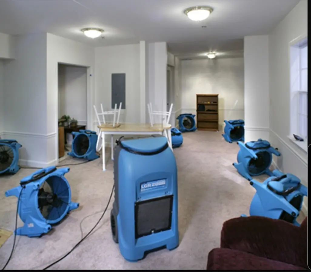 Air movers and dehumidifier setup for Water Extraction & Removal in Kyle